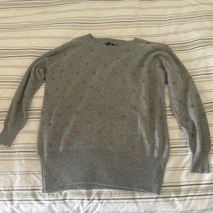 Grey and gold polka dot sweater.
